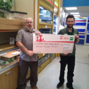 Inverness Pets at Home presenting Scottish Exotic Animal Rescue with £18,000