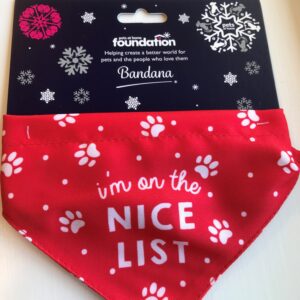 Pets Foundation Santa Paws red bandana with "I'm on the nice list" and white paw prints on the front